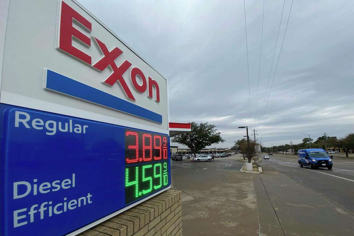 Gas prices are displayed at an Exxon/7-Eleven convenience store in Dallas this week. The price of gas hit record highs in San Antonio and elsewhere in Texas.