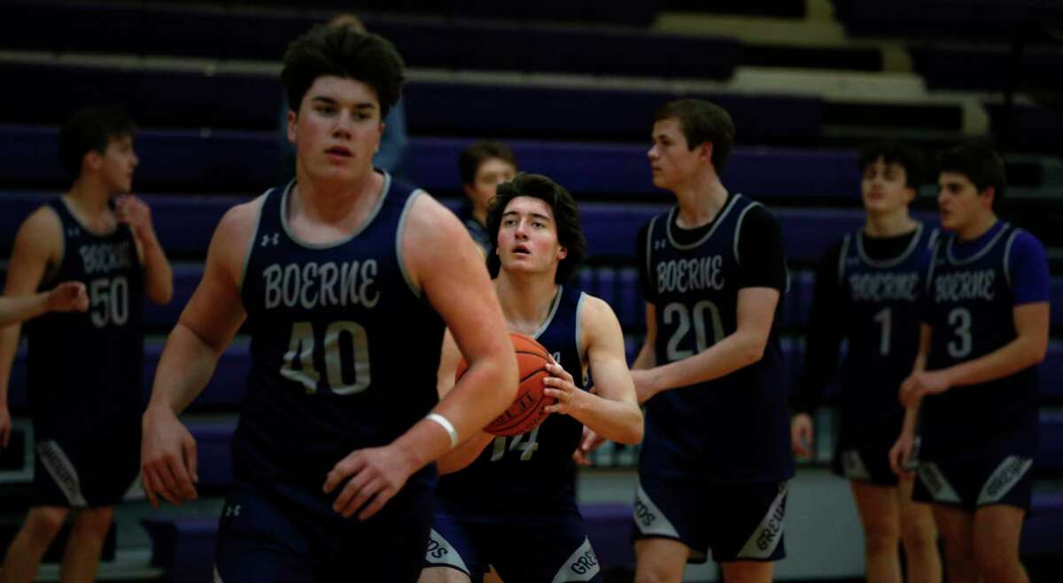 Boerne forward Houston Hendrix (14) goes thru shooting drills with the rest of the team in preparation for their UIL play-off game on Tuesday, March 8, 2022.