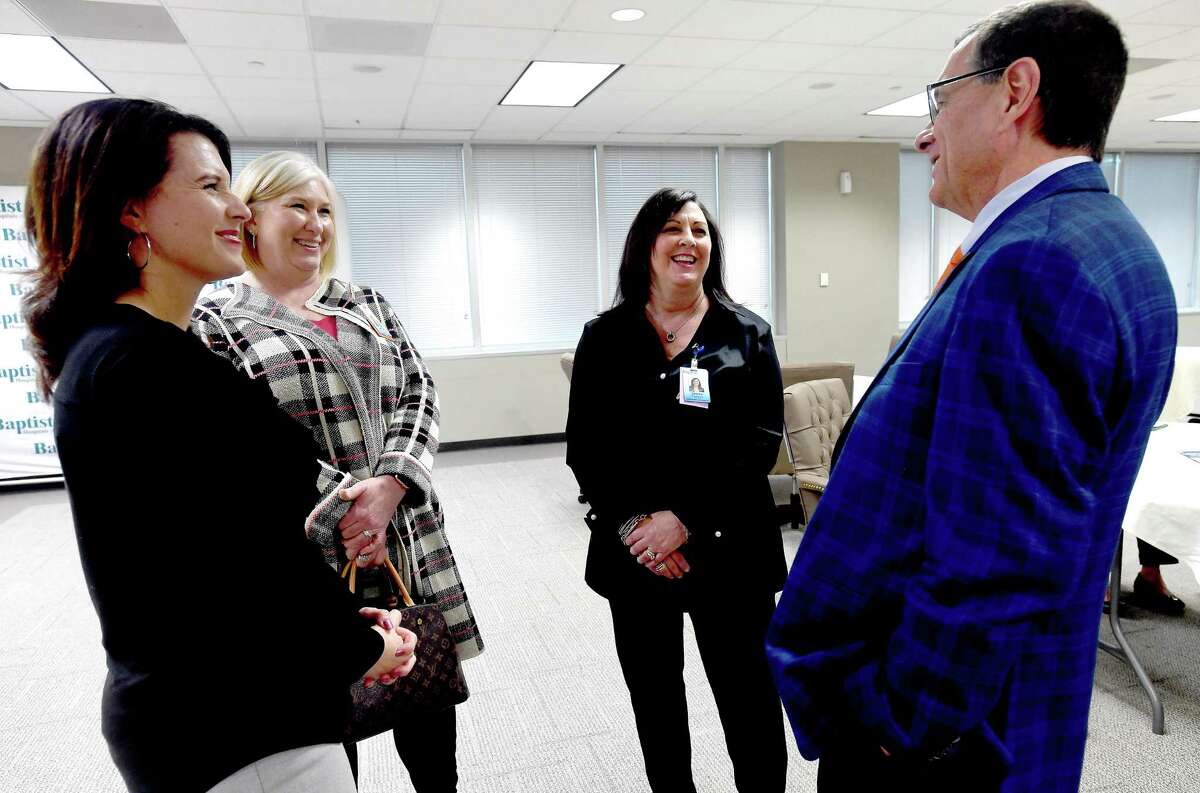 From left, Baptist Hospital's Stephanie Harris, Johnal Worthington and Deena Brevell talk with SHSU-COM's Dr. Stephen McKernan during a reception to welcome and thank physicians who will serve as mentors - known as "preceptors" - with Sam Houston State University's inaugural class of medical students beginning their first clinical rotations at the hospital August 1. A similar event was held at Christus of Southeast Texas last spring, and a final event is forthcoming at the Medical Center of Southeast Texas, the third local facility partnering with SHSU's medical school students for a year of clinical experience. SHSU hopes to recruit additional physicians at the events, as well, inviting a number of affiliated doctors to the meet and greet dinners. Photo made Wednesday, March 9, 2022 Kim Brent/The Enterprise