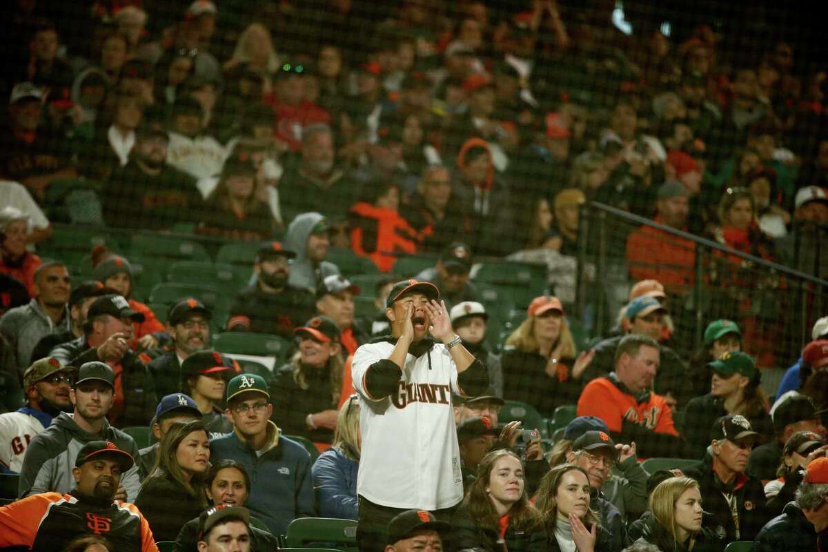 Fans in the tenth inning during an MLB game between the San Francisco Giants and Oakland Athletics at Oracle Park, Saturday, June 26, 2021, in San Francisco, Calif.