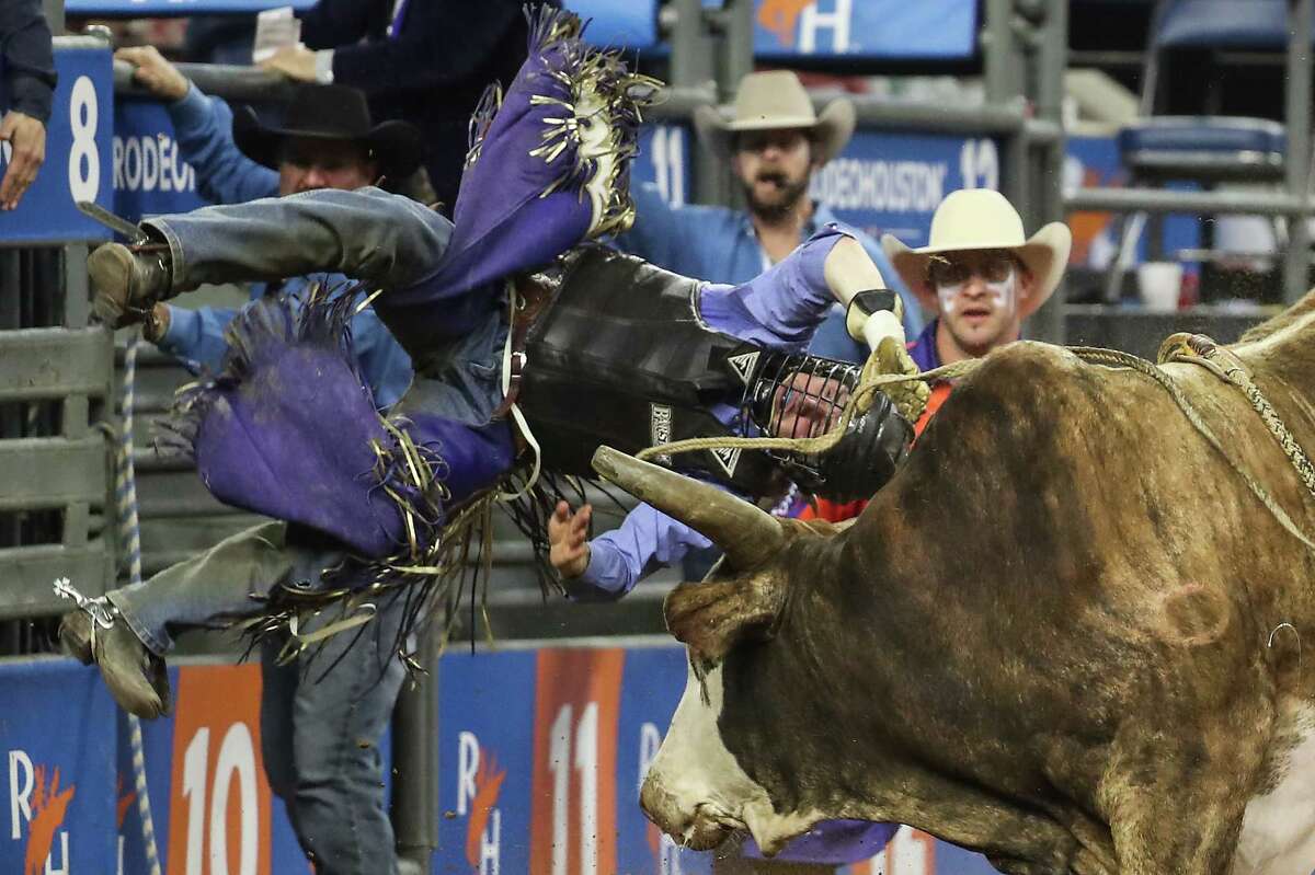 Brody Yeary is bucked off by Milburn Special in the bull riding competition during Super Series IV, Round 2, at Rodeo Houston Thursday, March 10, 2022 in Houston.