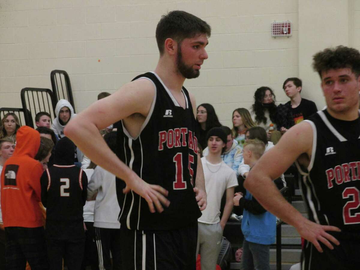 Portland senior center Eli Evison, with a future as a big guard in college, took center stage in Portland's Division V boys basketball second-round win over Terryville Thursday night at Terryville High School.