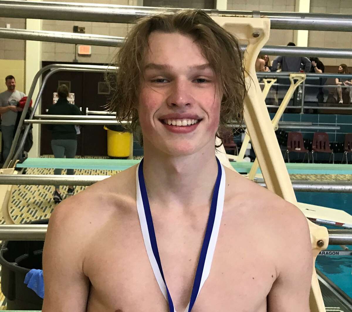 John Courtemanche from Northwestern won the Class S diving title.