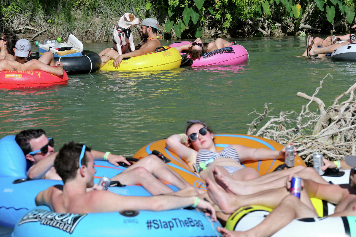 Tubers float the San Marcos River while attending Float Fest held at Cool River Ranch Sunday July 17, 2016 in Martindale, Tx.