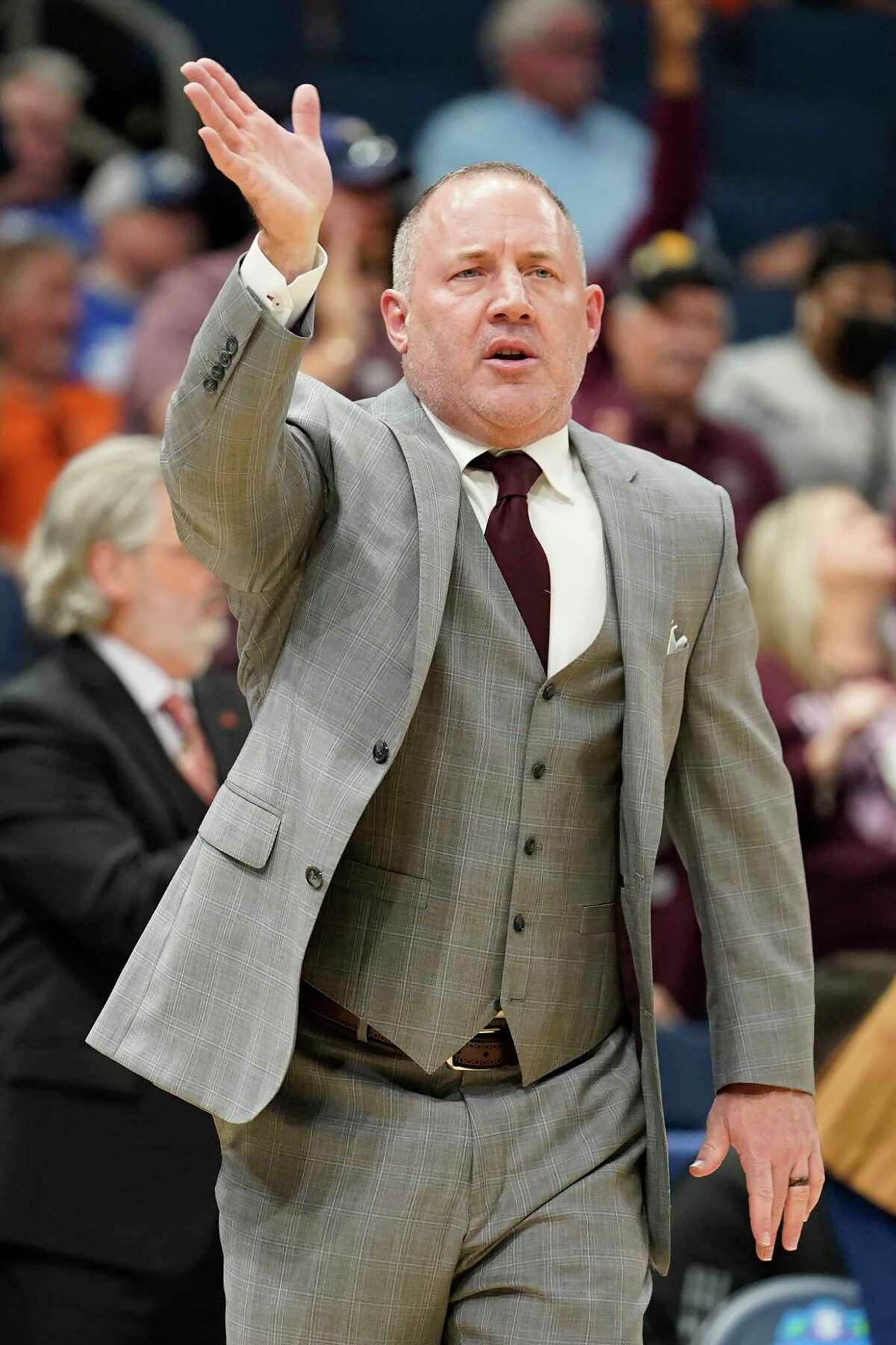 Texas A&M head coach Buzz Williams calls a play during the first half of an NCAA men's college basketball Southeastern Conference tournament game against Auburn Friday, March 11, 2022, in Tampa, Fla. (AP Photo/Chris O'Meara)
