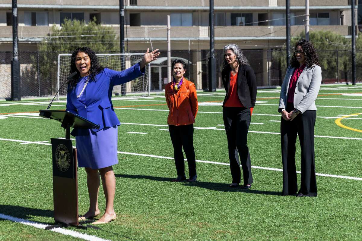 San Francisco Mayor London Breed (left) introduces Ann Hsu, Lainie Motamedi, and Lisa Weissman-Ward during their swearing-in ceremony as members of the Board of Education at Galileo High School in San Francisco. The three appointees will serve out the remaining terms of the three recalled commissioners.