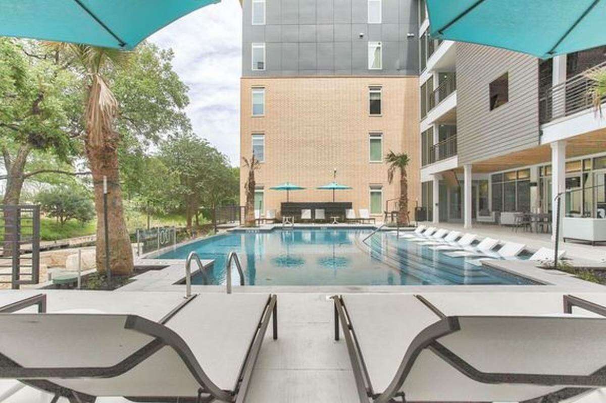 We're back downtown looking at this apartment with luxury amenities near a posh River Walk area