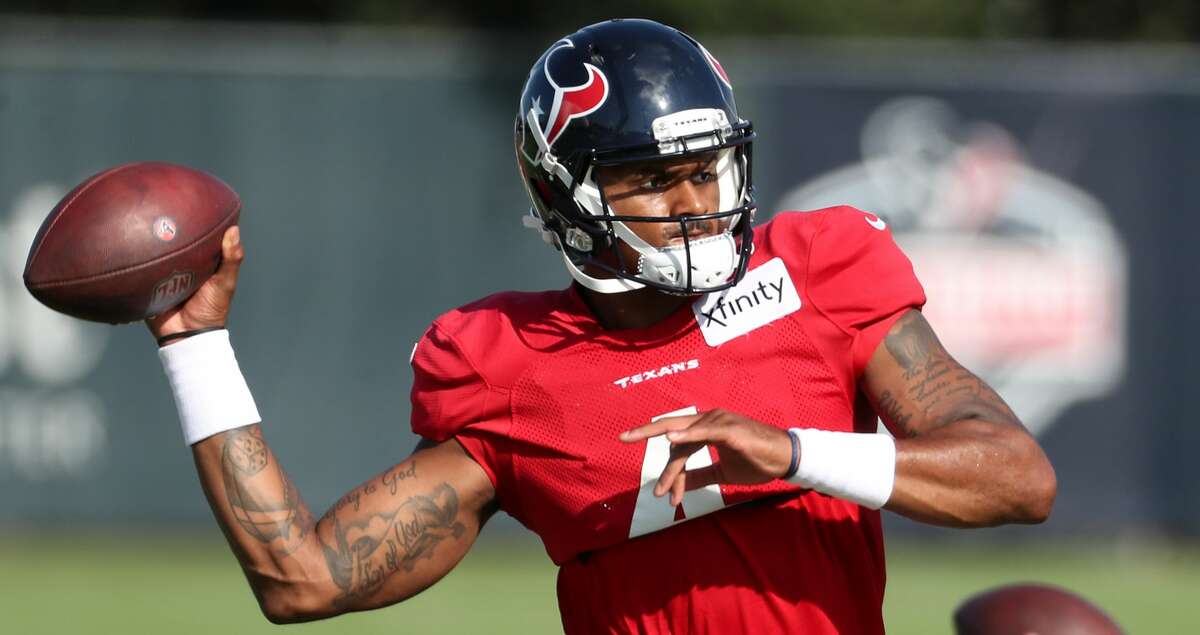 Houston Texans quarterback Deshaun Watson drops back to pass during an NFL training camp football practice Tuesday, Aug. 10, 2021, in Houston.