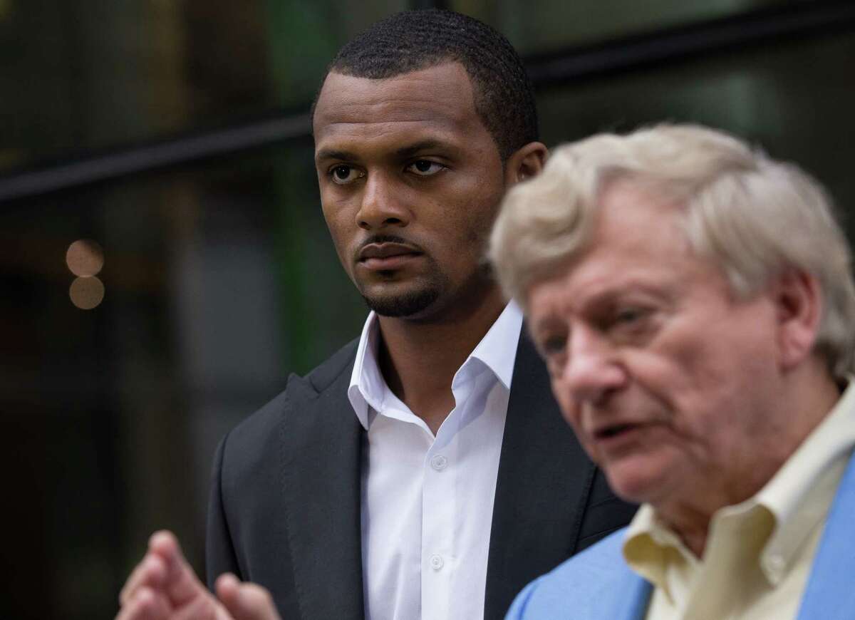 Texans quarterback Deshaun Watson talks to reporters after a Harris County grand jury declined to indict him and chose not to criminally charge him in nine alleged instances of sexual assault or harassment during various private massage appointments, on Friday, March 11, 2022, in Houston. The decision came down the same day Watson was deposed in connection with two of the 22 civil lawsuits against him.
