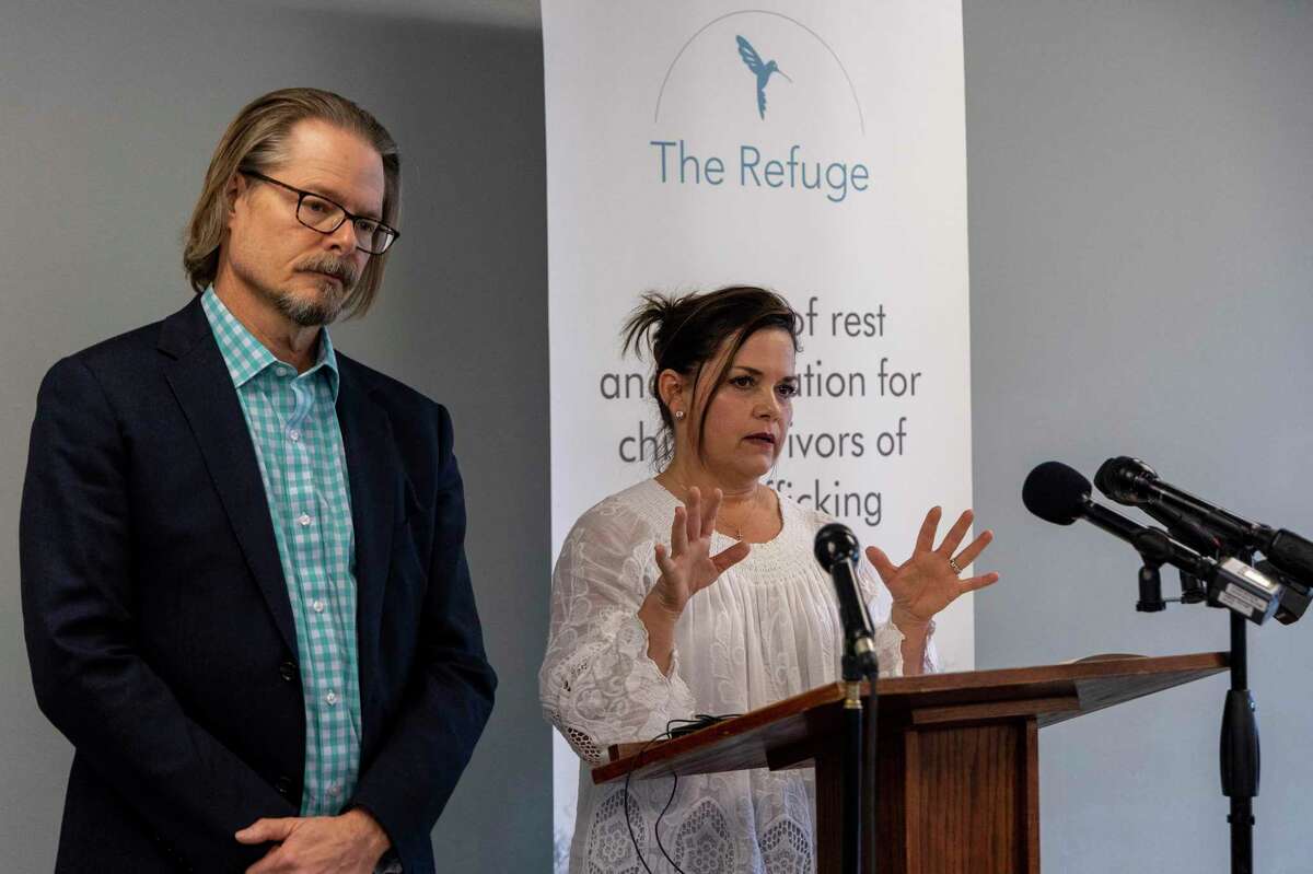 Steven Phenix, communication director, and Brooke Crowder, CEO and founder of the Refuge, speak to the media March 11 about two incidents of allegations against staff at the Bastrop foster care home for girls who have been sexually trafficked.