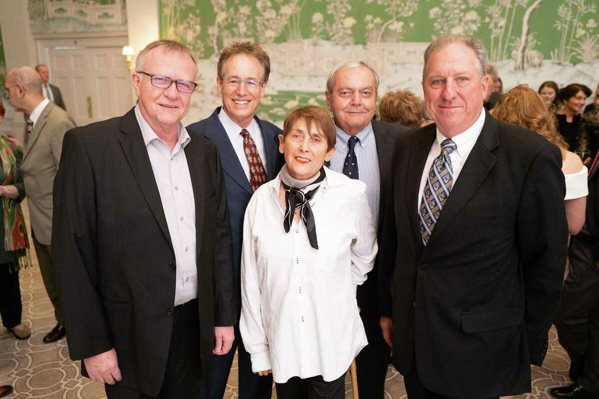 Wolfgang Pfirmann, John Thomas, Anne and Jean Louis Breux and Craig Blanchard at Preservation Houston's 2022 Cornerstone Dinner at the River Oaks Country Club. Thomas and his wife, Linda, received a Good Brick Award for restoring their River Oaks home, the (1937) Childress House, one of the first modern homes in the city, after a 2019 fire.