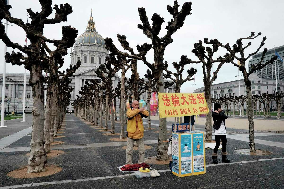 People practice Falun Gong at Civic Center Plaza in San Francisco on Feb. 10, 2017. On Friday, the Ninth Circuit ruled that a Falun Gong organizer who fled China for California was eligible for political asylum.