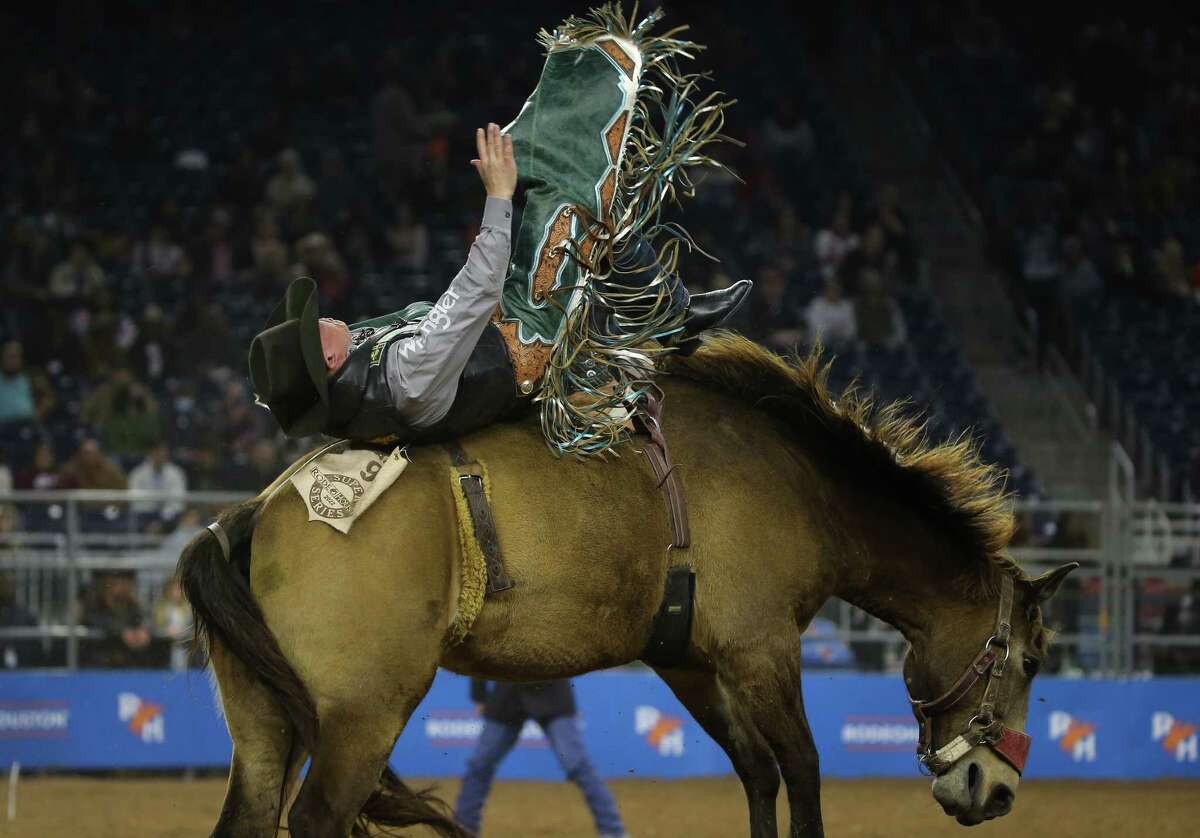 Tanner Aus scores 84 points in bareback riding during Super Series IV Round 3 at the Houston Livestock Show and Rodeo Friday, March 11, 2022, at NRG Stadium in Houston.