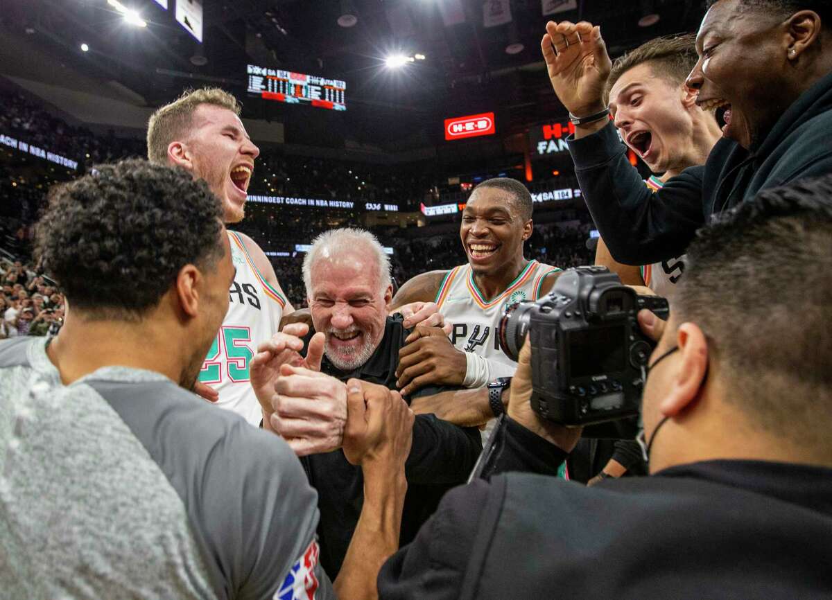 San Antonio Spurs head coach Gregg Popovich celebrates Friday, Mar 11, 2022 at the AT&T Center in San Antonio after winning his 1,336th game to give him the most all-time regular season coaching wins in NBA history.