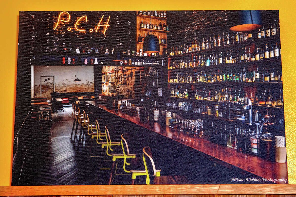 A photograph of the old location of Pacific Cocktail Haven was on the wall of the new location in San Francisco on Mar. 11, 2022. The bar is reopening in a new location after being closed for more than a year following a destructive fire in February 2021