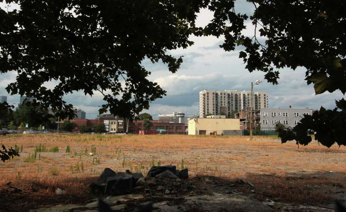 A view of the former B&S Carting site between Walter Wheeler Drive and Woodlawn Avenue in Stamford, Conn., on Thursday July 22, 2021. Developer Building and Land Technology wanted to put more apartments there, but residents have fought the plan.
