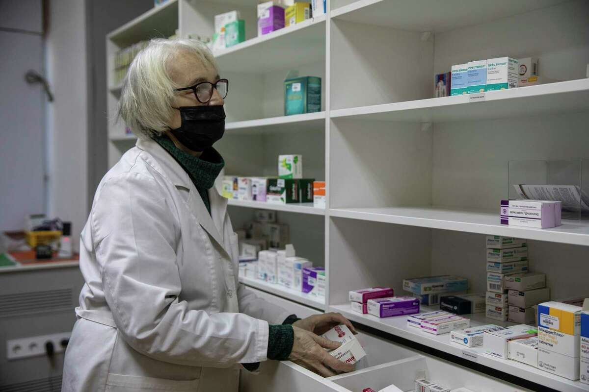 Ukrainian pharmacist Tetyana Rutkis in her pharmacy, in Kyiv on March 9, 2022. She said she is quickly running out of essential medicines.