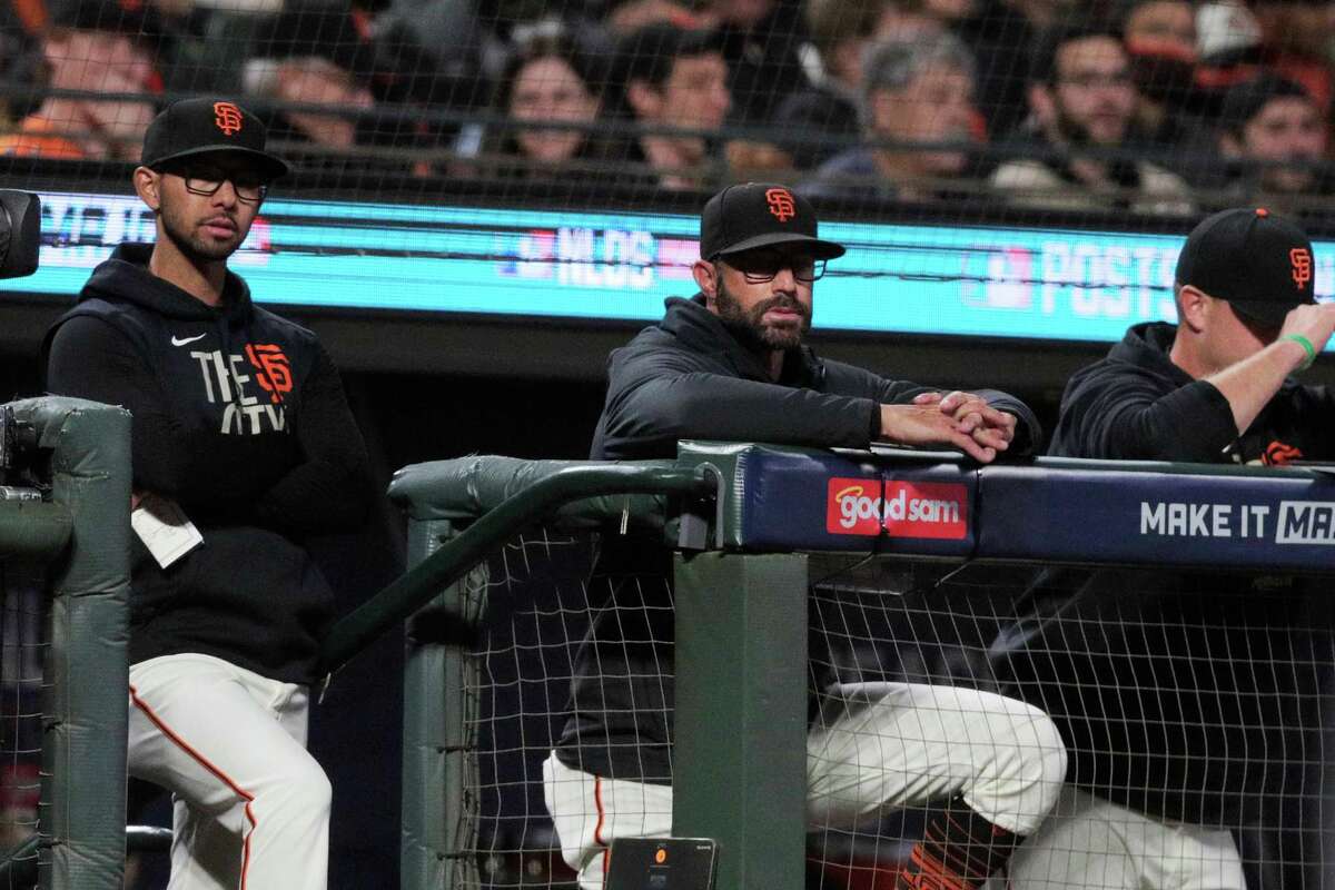 San Francisco Giants manager Gabe Kapler watches from the dugout as the San Francisco Giants played the Los Angeles Dodgers in Game 5 of the National League Division Series at Oracle Park in San Francisco, Calif., on Thursday, Oct. 14, 2021.
