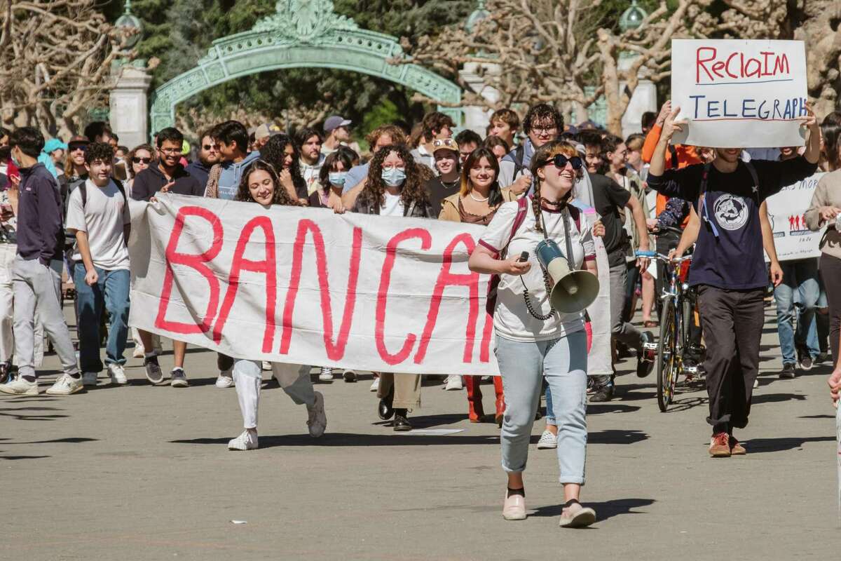 Students march from Sproul Hall at UC Berkeley down Telegraph Ave. on Saturday, March 12, 2022. Telegraph for People is a student organization fighting for a car-free Telegraph Ave. near the UC Berkeley campus to improve safety for pedestrians and bikers.