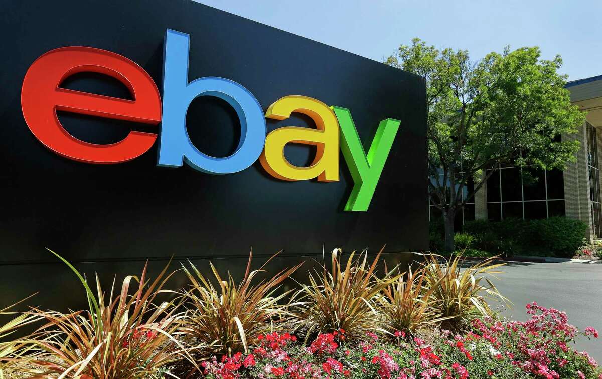 FILE - This Tuesday, July 16, 2013, file photo shows signage at eBay headquarters in San Jose, Calif. (AP Photo/Ben Margot, File)