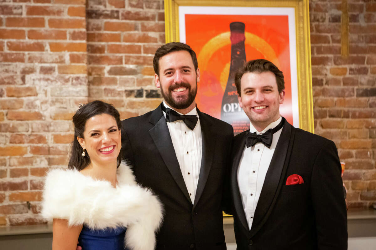 Left to right, guest performer, Opera Edwardsville (OE) founder and artistic director Chase Hopkins, of Edwardsville, and guest performer at a champagne reception following OE's inaugural 2018 "Christmas at The Wildey" concert.