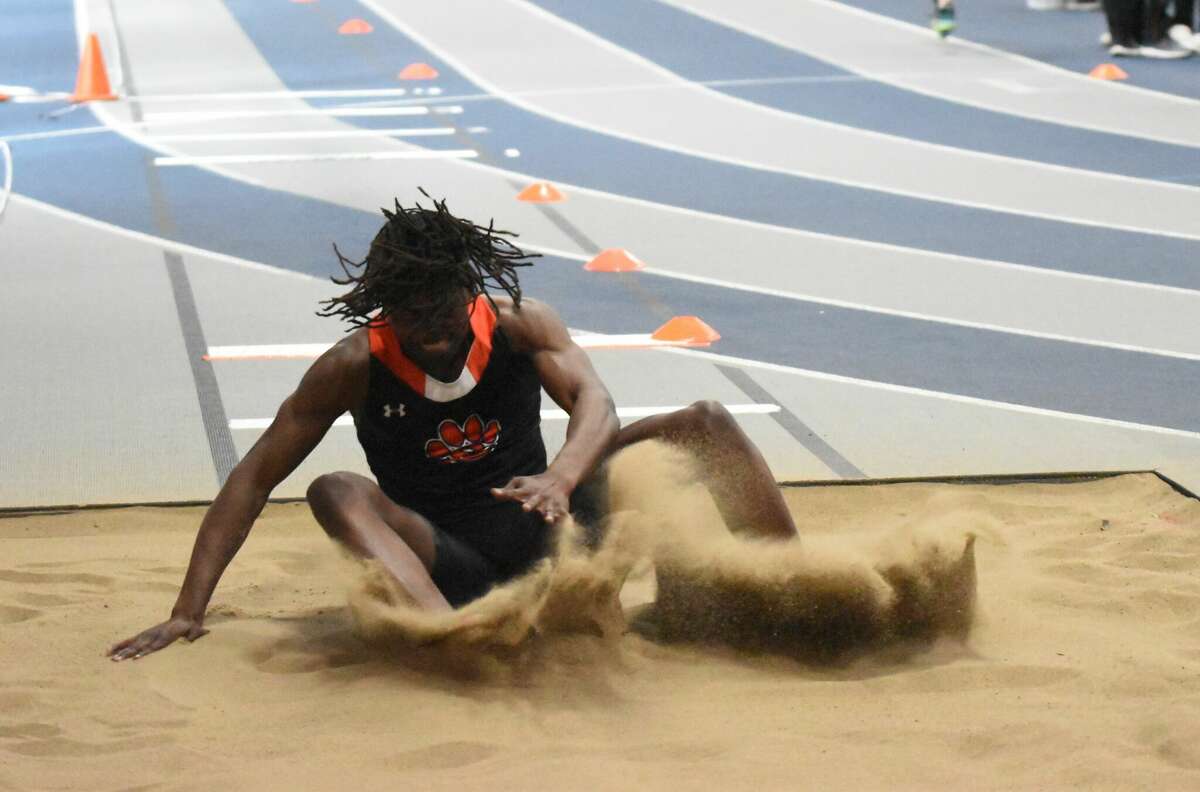 Malik Allen wins the triple jump at the Tiger Indoor Meet on Friday at Principia College in Elsah.