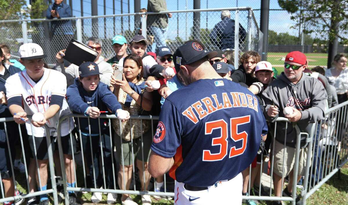 Houston Astros Justin Verlander signs autographs after he pitched two simulated innings as Astros players reported to spring training camp after the MLB lockout ended last week at The Ballpark of the Palm Beaches on Sunday, March 13, 2022 in West Palm Beach .