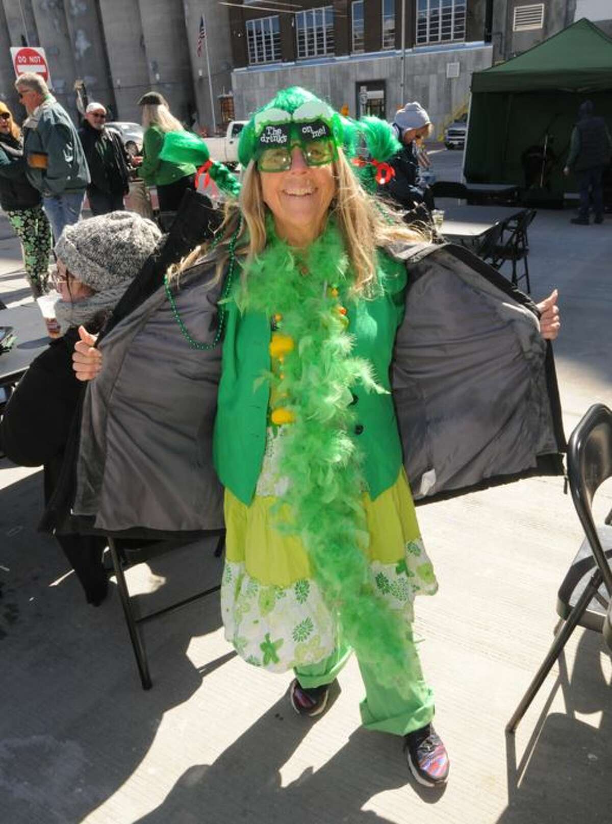 Nancy Marlow of Godfrey shows off her green during the St. Pat's Pub Crawl Saturday in Alton. “I’m McMarlow today. Or is it O’Marlow? I don’t know, but everybody is Irish today, ” she said.