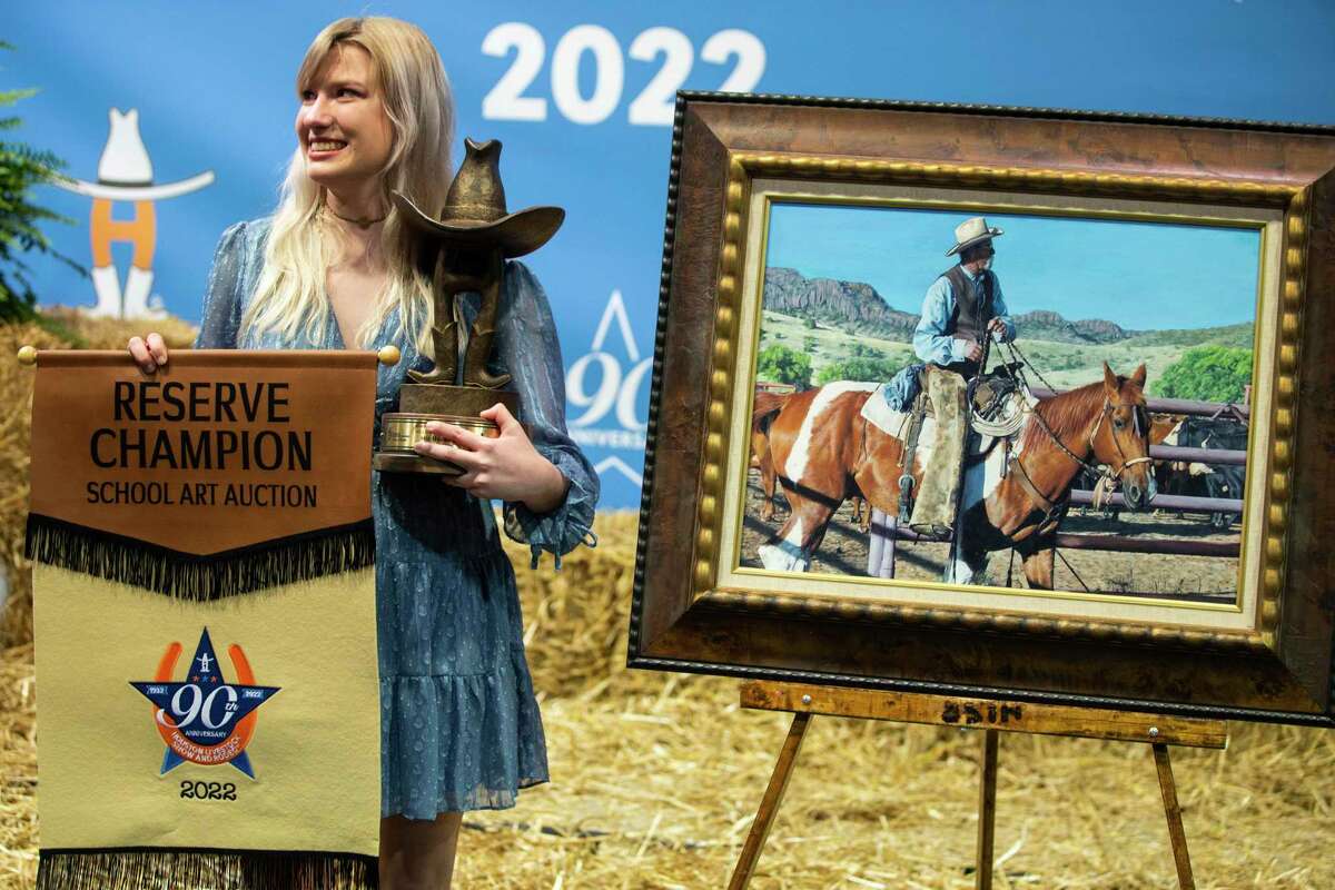 Mia Huckman is all smiles after her Reserve Grand Champion artwork, a painting titled “Partners in Time” was auctioned off for a record $265,000 during the school art auction at the Houston Livestock Show and Rodeo on Sunday, March 13, 2022 in Houston.