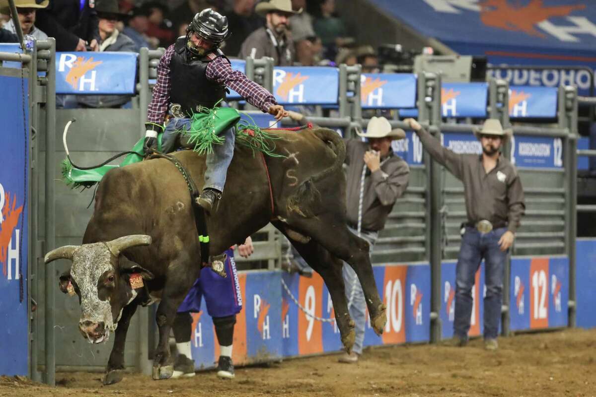 Braden Richardson rides Heartaches and Grief for an 81 in the bull riding competition during Super Series V, round 1, at RodeoHouston Sunday, March 13, 2022 in Houston.