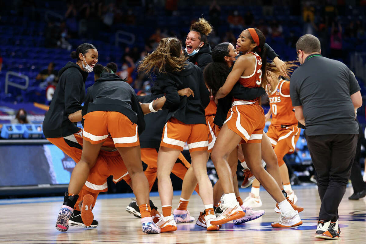 Charli Collier #35 of the Texas Longhorns celebrates with teammates after defeating the Maryland Terrapins in the Sweet Sixteen round of the NCAA Womens Basketball Tournament at Alamodome on March 28, 2021 in San Antonio, Texas. (Photo by Justin Tafoya/NCAA Photos via Getty Images)