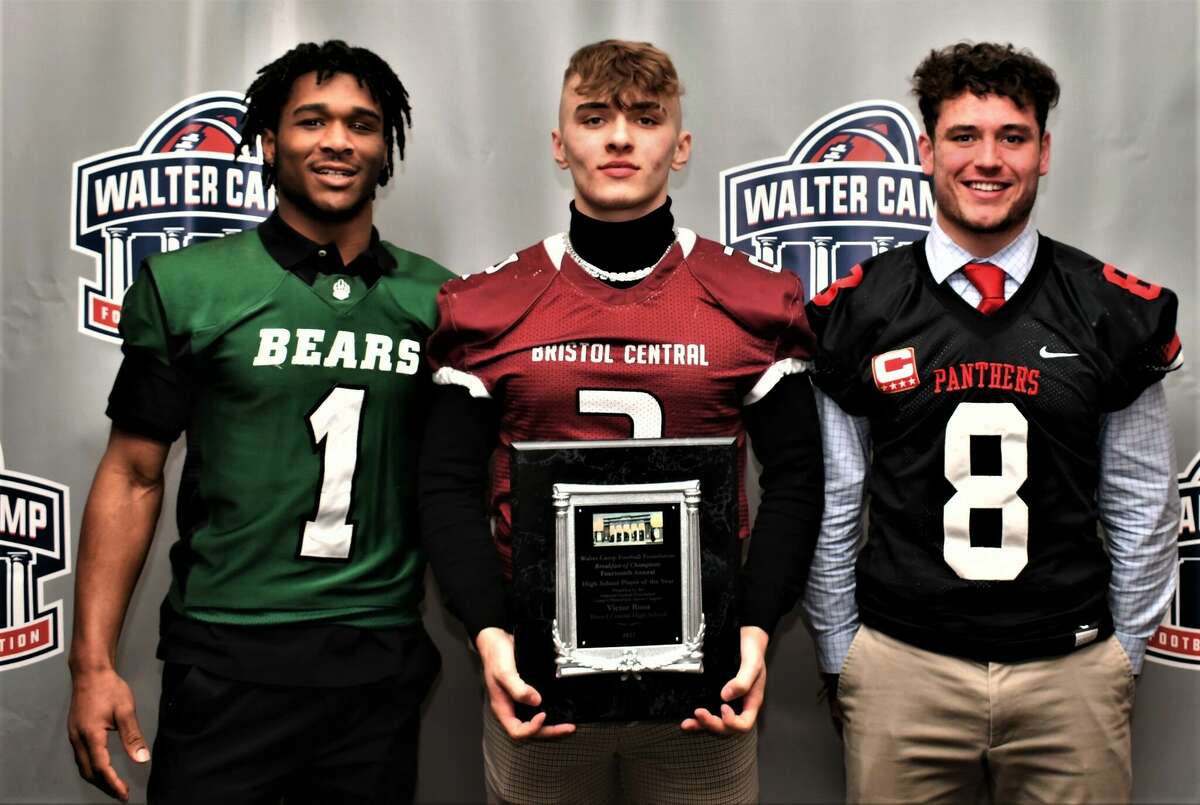 Bristol Central's Victor Rosa (center) poses with his Walter Camp Connecticut Player of the Year award alongside nominees Norwalk's Camryn Edwards (left) and Cromwell/Portland's Teddy Williams during the 14th Annual Breakfast of Champions at the Omni Hotel, New Haven, Sunday, March 13, 2022.
