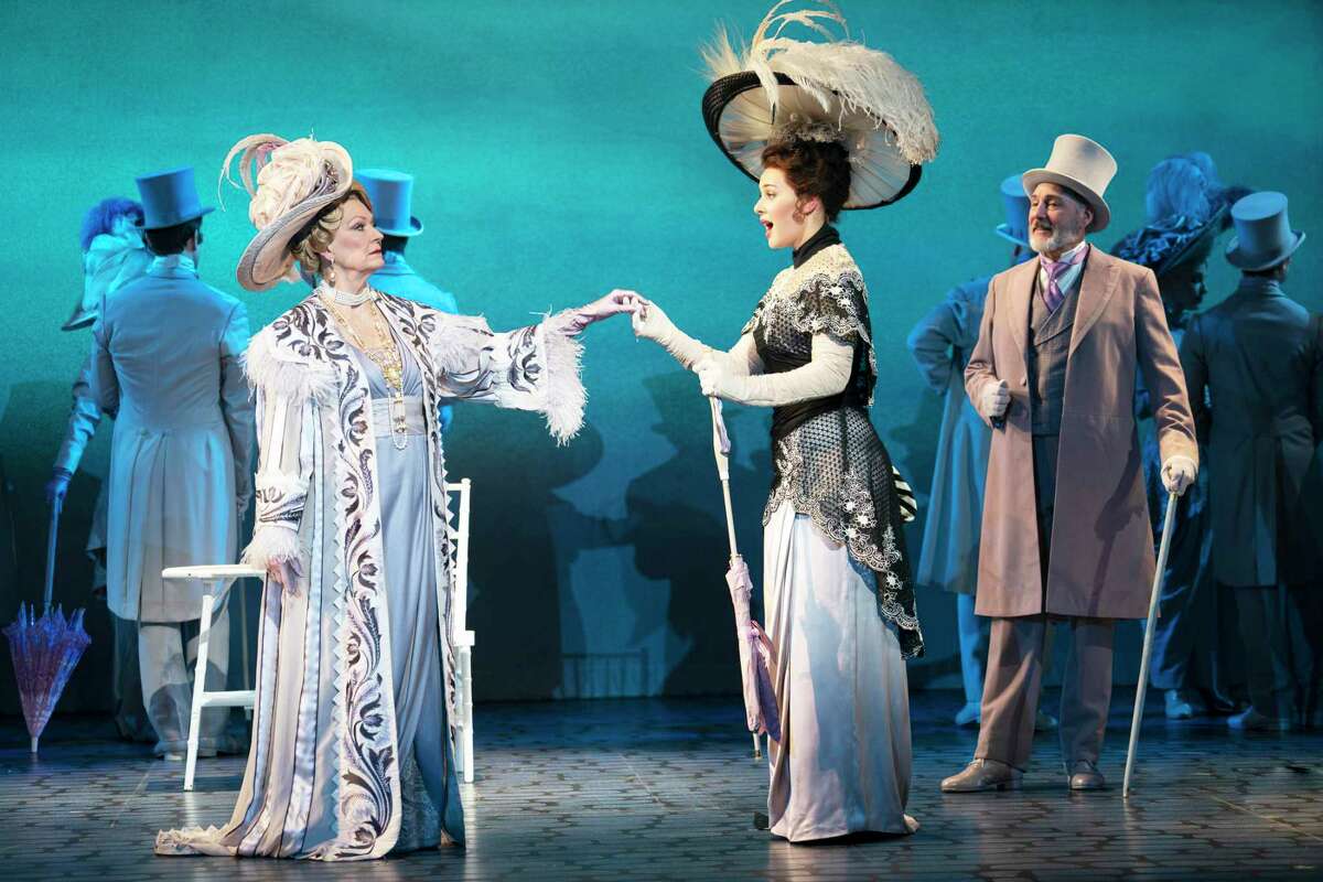 From left, Leslie Alexander as Mrs. Higgins, Shereen Ahmed as Eliza Doolittle and Kevin Pariseau as Colonel Pickering perform “My Fair Lady” at the Bushnell Performing Arts Center in Hartford.