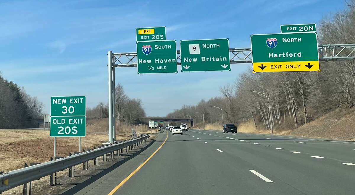 New exit signs are posted along Route 9 North in Middletown, along with signs identifying the previous exit number, as part of a statewide highway renumbering project, on Friday, March 11, 2022.