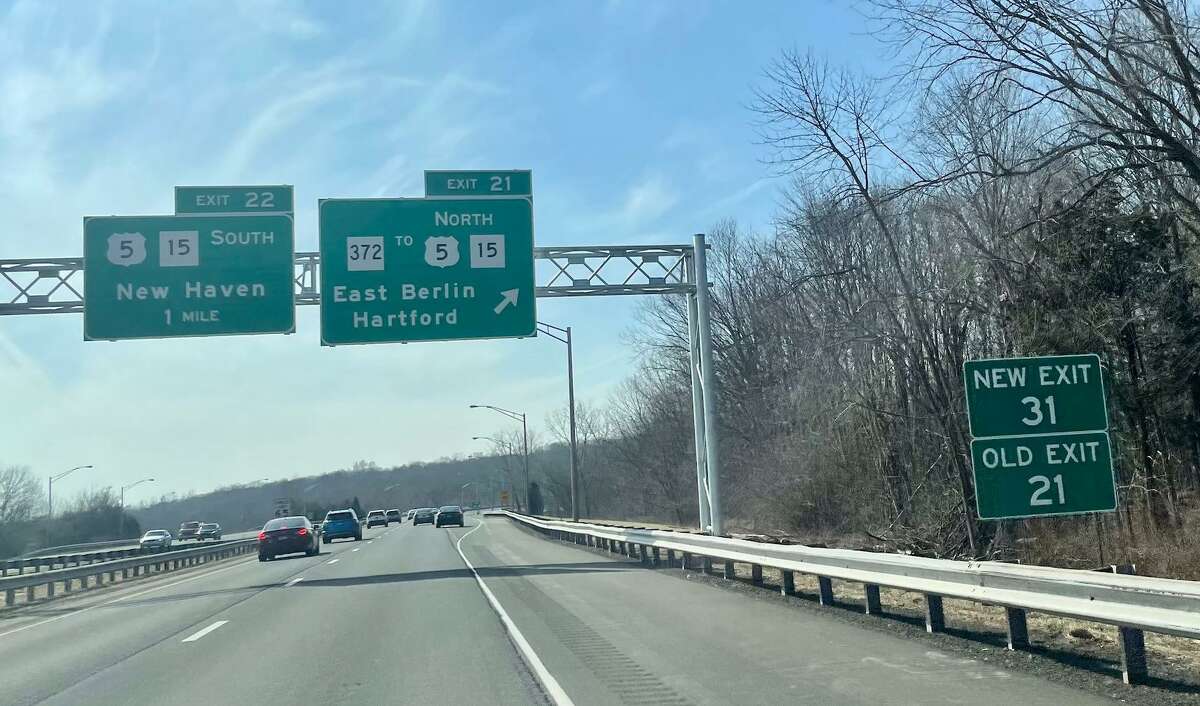 New exit signs are posted along Route 9 North in Middletown, along with signs identifying the previous exit number, as part of a statewide highway renumbering project.