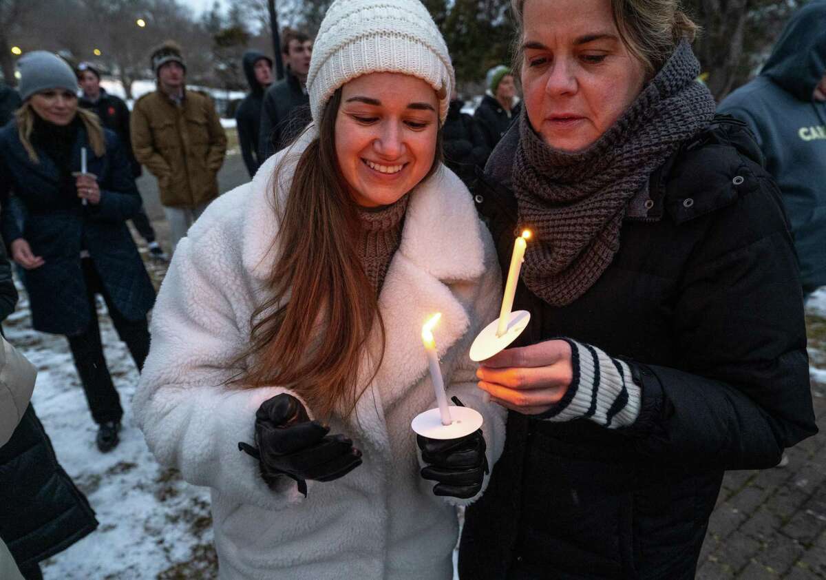 Ridgefield residents gather in Ballard Park for a candlelight vigil to stand in solidarity with Ukraine amid the ongoing invasion from Russia. Sunday, March 13, 2022, Ridgefield, Conn.