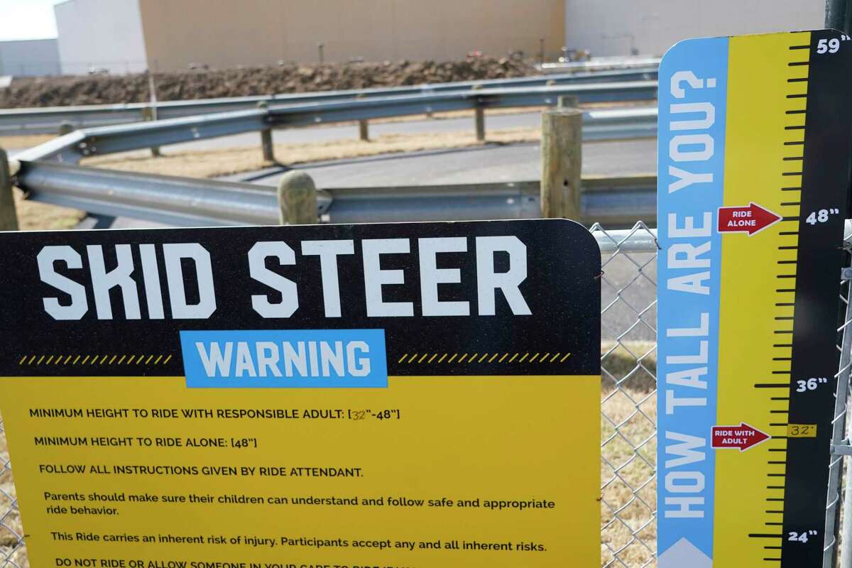 The sliding direction track sign is shown at Dig World, a construction-themed adventure park, Monday, March 14, 2022, in Katy.  Dig World opens March 17 at Katy Mills Mall, 5000 Katy Mills Circle.