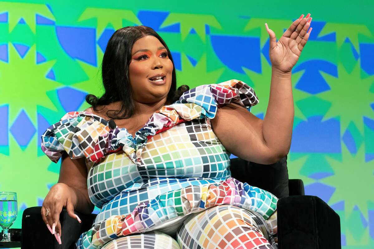 Grammy-winning singer, rapper, songwriter and flutist Lizzo appears on stage during a keynote session at the 2022 SXSW Conference and Festival at the Austin Convention Center in Austin, Texas, on March 13, 2022.
