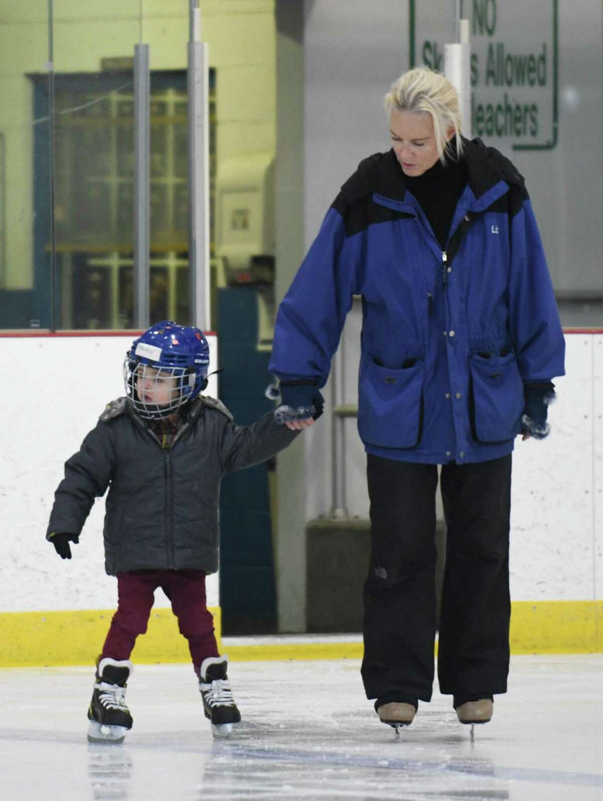 Greenwich's Brody Neri, 4, gets a skating lesson from Liz Leamy at Dorothy Hamill Skating Rink in the Byram section of Greenwich, Conn. Thursday, March 3, 2022.