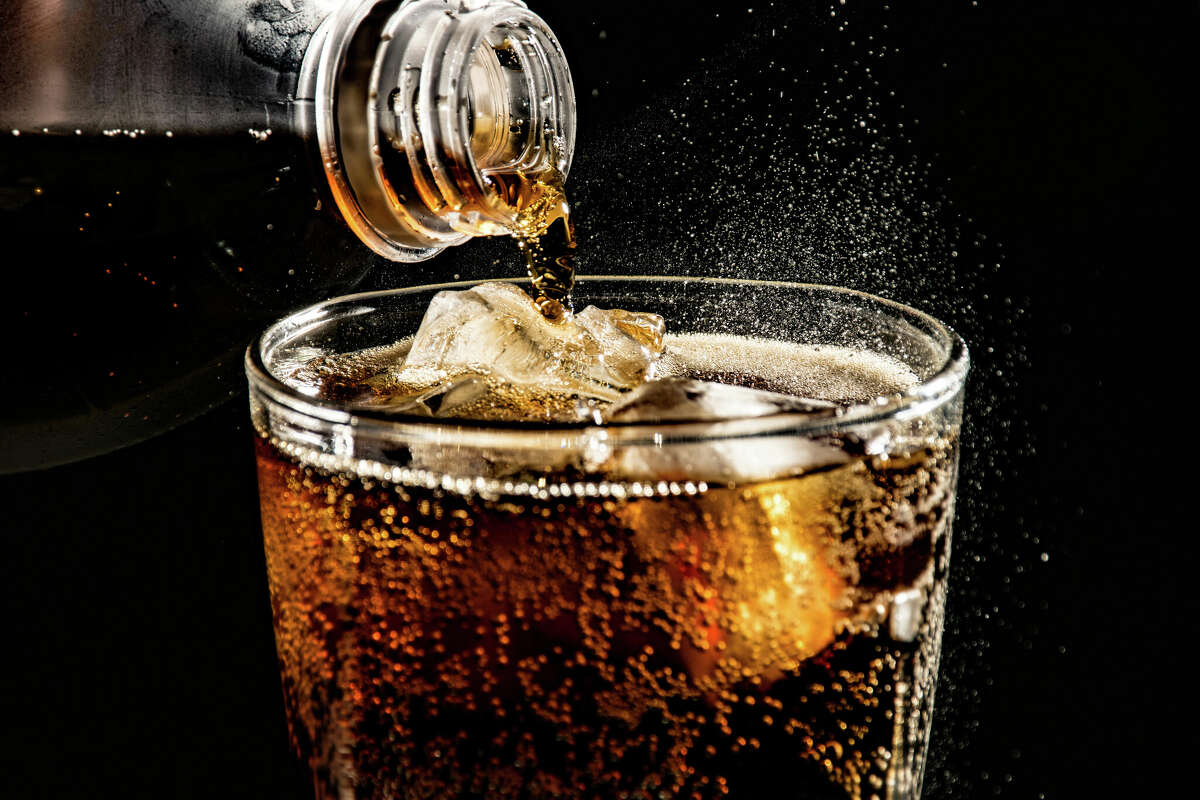 A close-up of Coca-Cola in a glass.