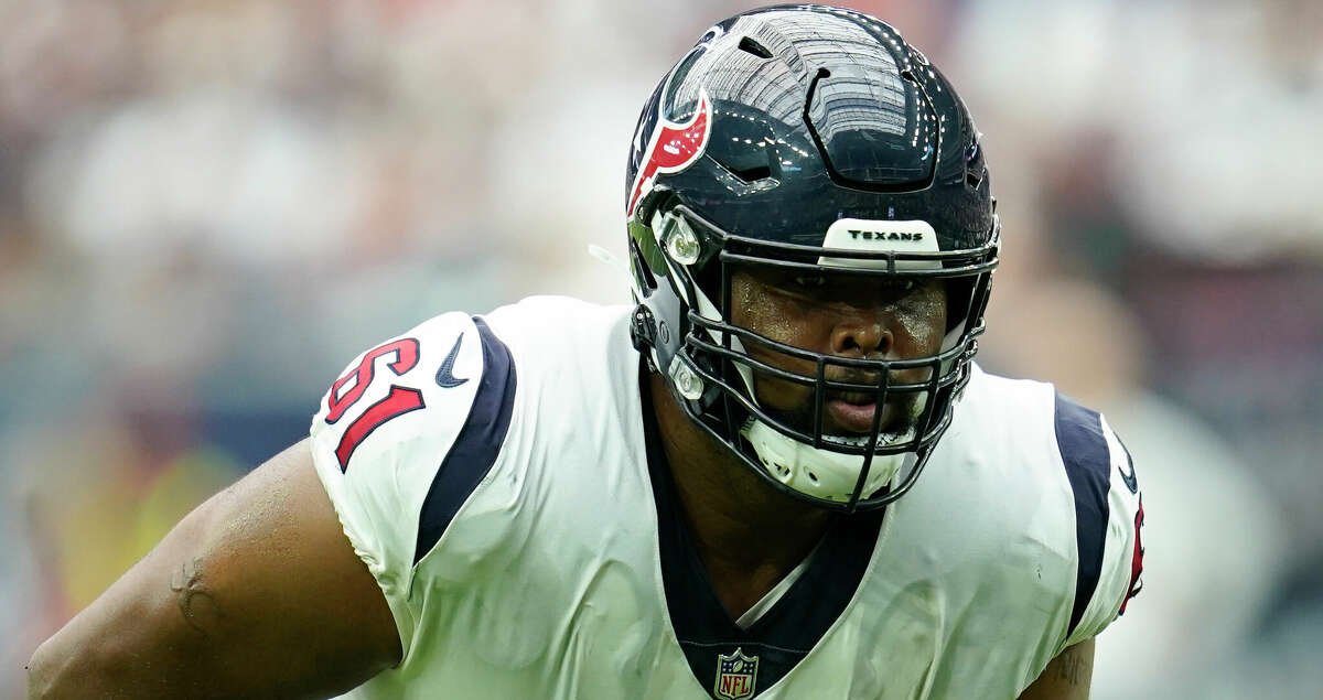 Houston Texans offensive lineman Marcus Cannon (61) looks to block during an NFL football game against the Jacksonville Jaguars, Sunday, Sept. 12, 2021, in Houston. (AP Photo/Matt Patterson)