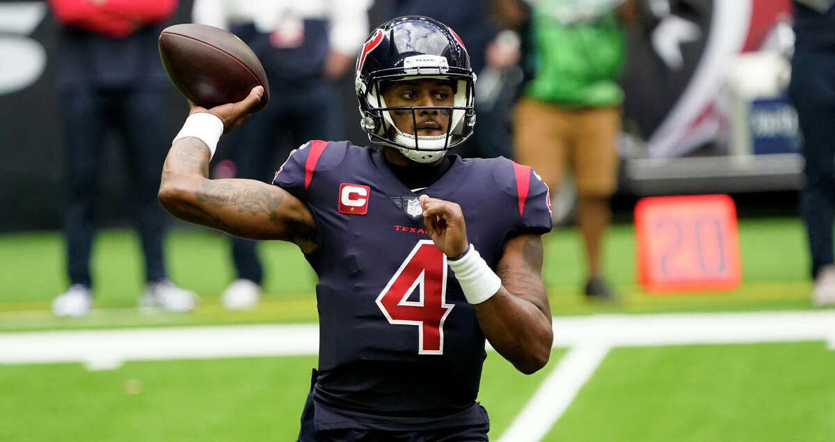 File-This Dec. 27, 2020, file photo shows Houston Texans quarterback Deshaun Watson (4) throwing a pass against the Cincinnati Bengals during the first half of an NFL football game in Houston. Watson plans to report to training camp with the Houston Texans. (AP Photo/Sam Craft, File)