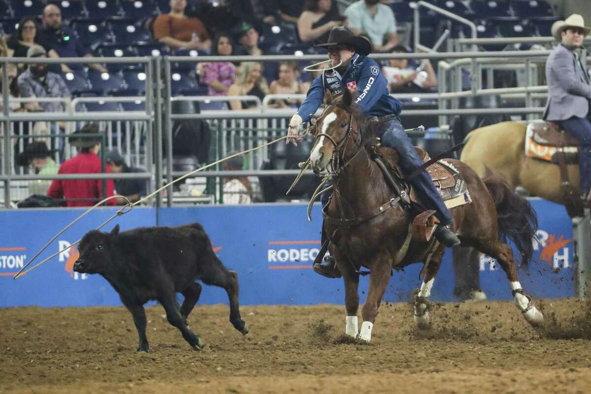 Marty Yates ropes his calf in tie down roping for a time of 8.8 during Super Series V, round 2 at RodeoHouston Monday, March 14, 2022 in Houston.