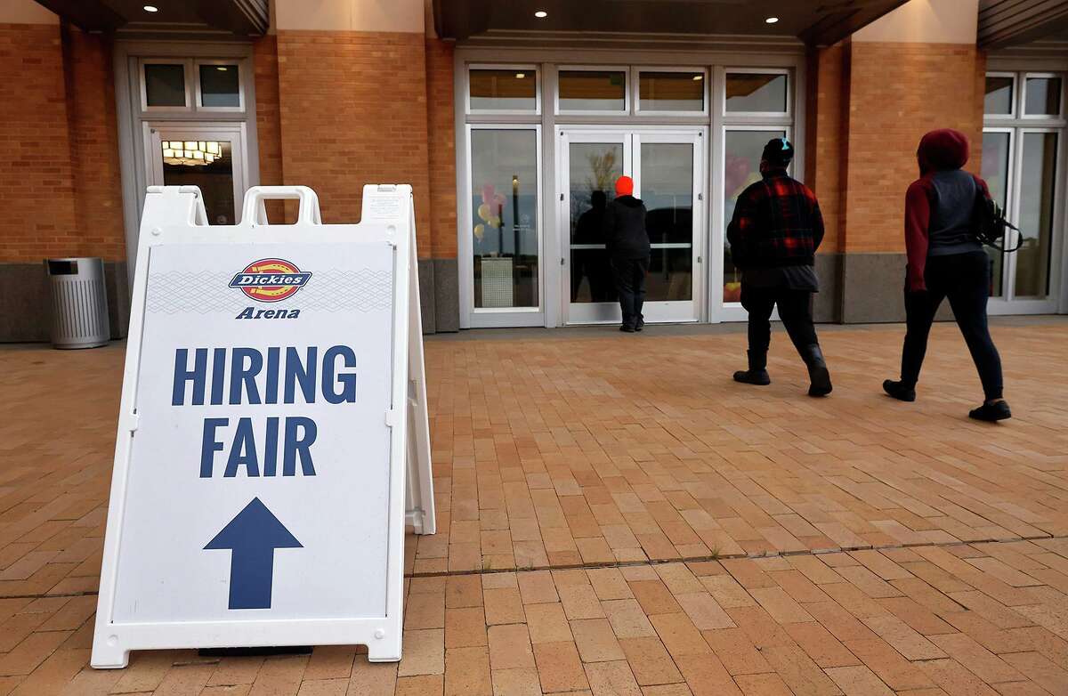People arrive for a Dickies Arena job fair where unemployed Texans can apply for positions at the Fort Worth venue, March 22, 2021. (Tom Fox/Dallas Morning News/TNS)