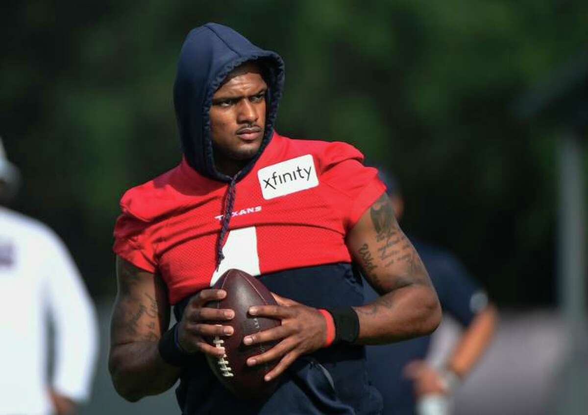 COMBO CAPTION FILE - Texans quarterback Deshaun Watson (4) practices with the team during NFL football practice Monday, Aug. 2, 2021, in Houston. A judge has declined efforts by attorneys for Houston Texans quarterback Deshaun Watson to delay all his depositions in connection with lawsuits filed by 22 women who have accused him of sexual assault and harassment. During a court hearing Monday, Feb. 21, 2022, defense attorney Rusty Hardin asked that depositions be delayed until the end of a criminal investigation. (AP Photo/Justin Rex File)