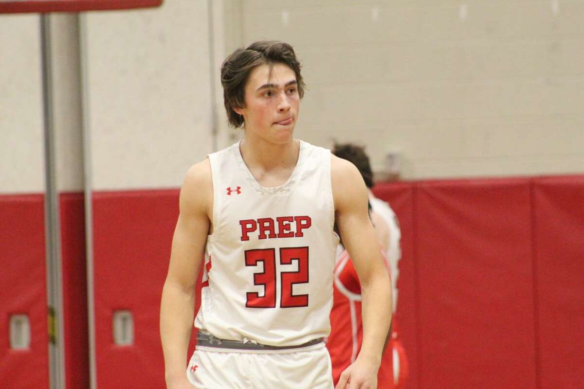 Fairfield Prep's Ryan Preisano hot a buzzer-beating 3-pointer to send the Jesuits in the Division I semifinals with a 57-55 win over NFA Monday at Fairfield Warde.