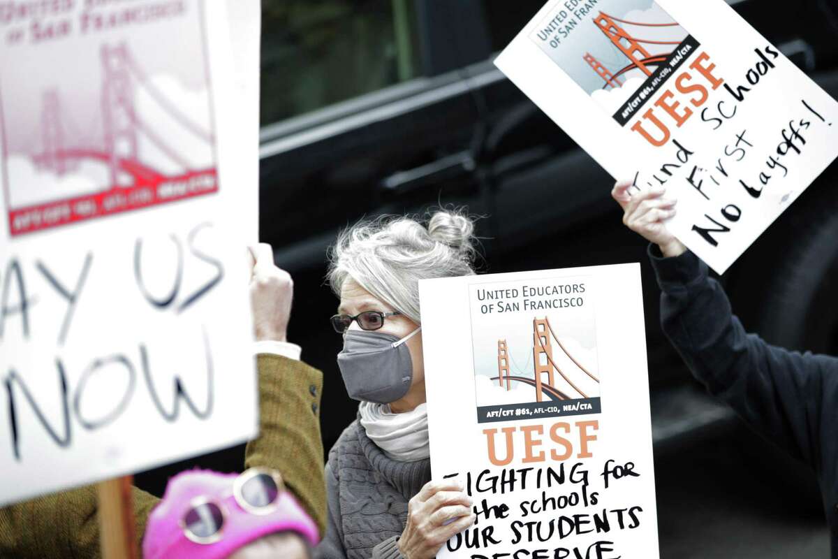 Members of UESF protest Monday outside San Francisco Unified School District headquarters.