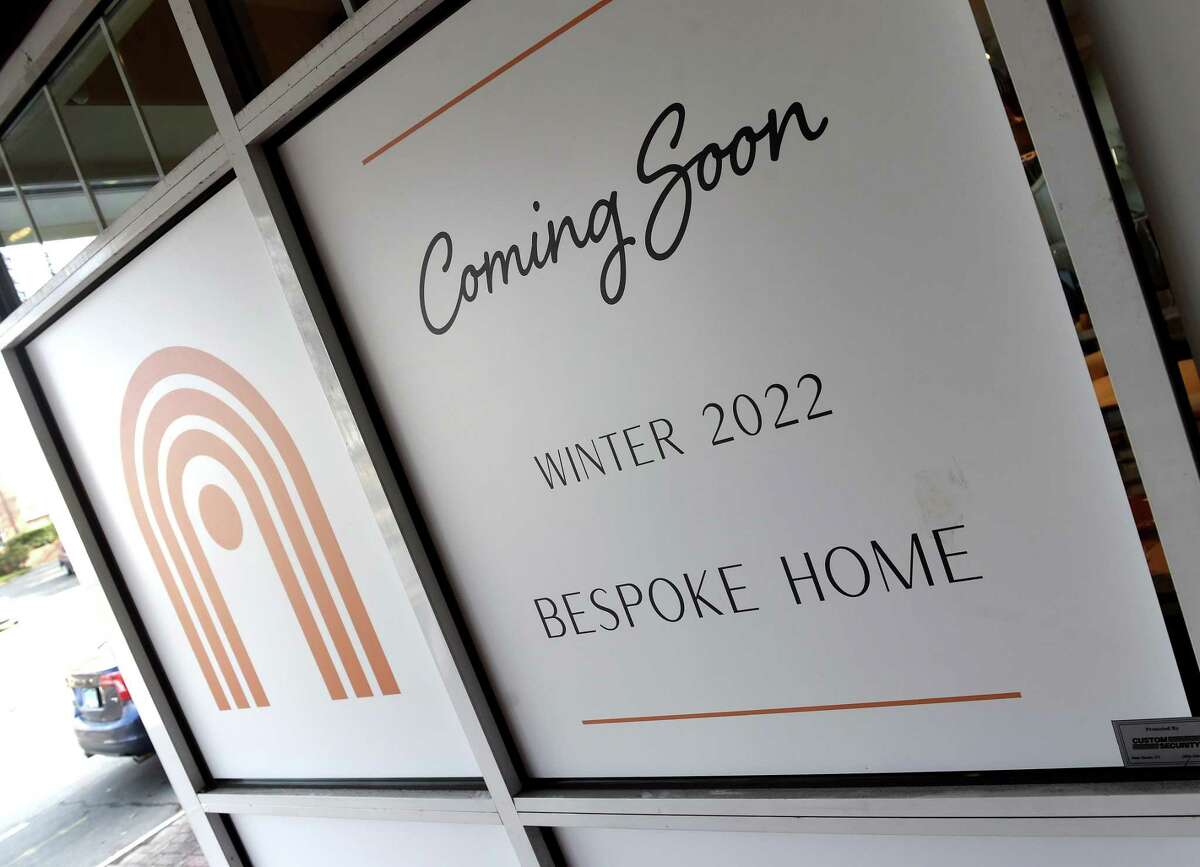 A sign advertises the opening of Bespoke Home on Main Street in Branford on March 10.