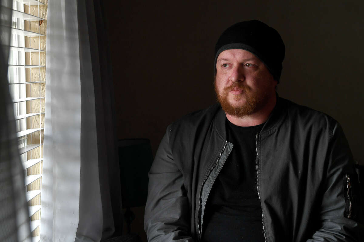 T.J. Rodman looks out from the living room of his home in Lumberton. Rodman is awaiting final word from various aid organizations before heading to Eastern Europe and aid in the humanitarian crisis unfolding as Russia's war in the Ukraine continues. Photo made Friday, March 11, 2022 Kim Brent/The Enterprise