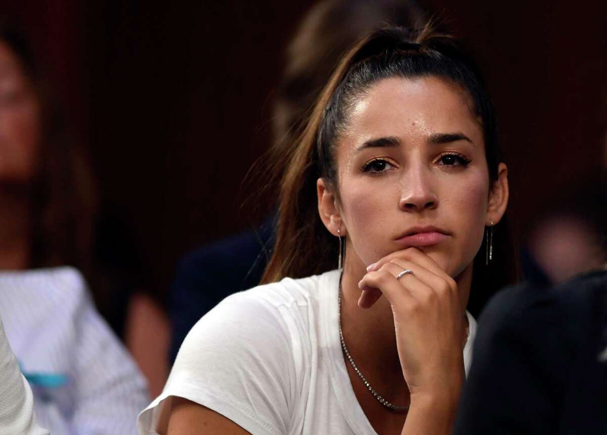 In this July 24, 2018 file photo, Olympic gold medalist Aly Raisman listens to testimony during a Senate Commerce subcommittee hearing in Washington. (AP Photo/Susan Walsh, File)